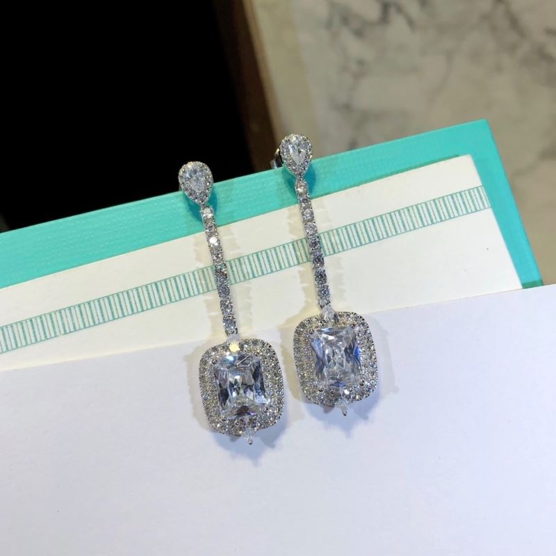 T*f*ny earrings